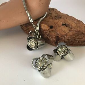 Germany made vintage chunky charm bracelet with clip on earrings.